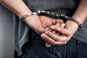 Handcuffs - Deportable Crimes for a permanent resident