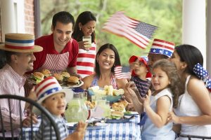 family celebrating fourth of july holiday