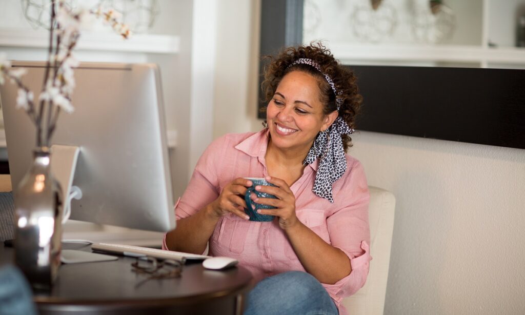 Woman prepares green card application online