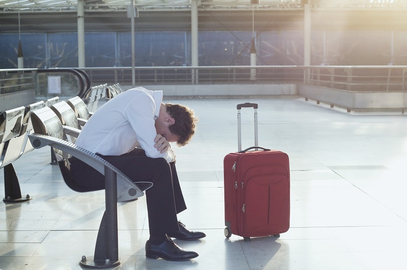 Traveler in despair with lost green card abroad while traveling