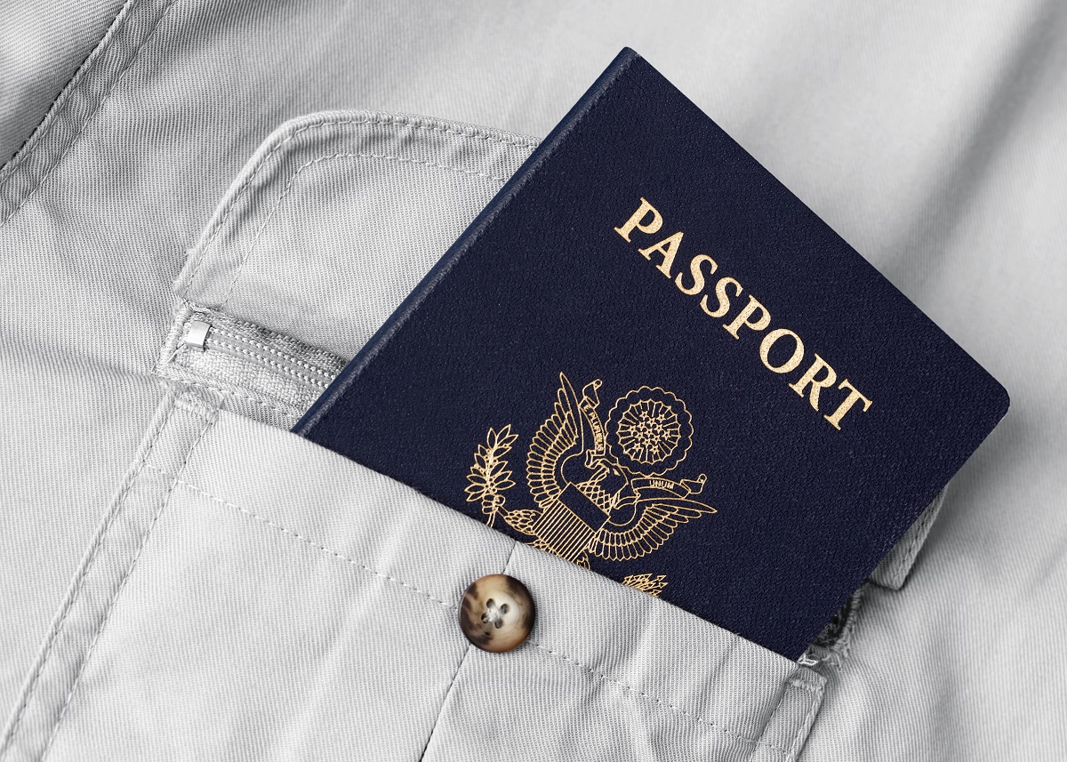 American passport represents US citizen vs US national