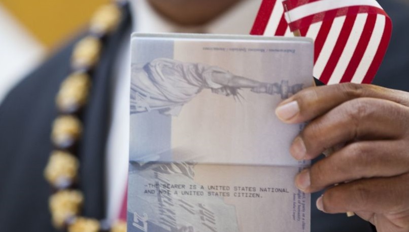 US national displays his passport
